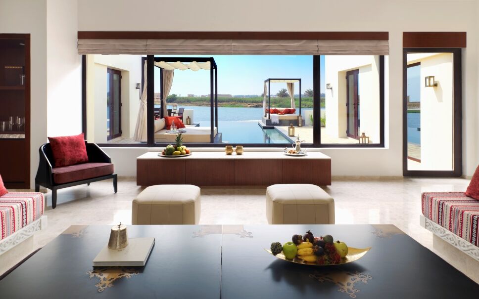 Al_Baleed_Resort_Salalah_by_Anantara_-_Lagoon_View_Infinity_Pool_Villa_Lounge.jpg